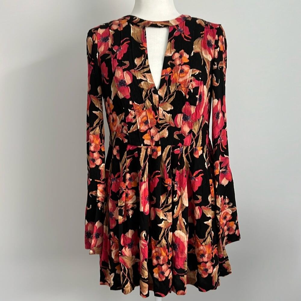 FREE PEOPLE Tegan mini floral dress with long bell sleeve size 4